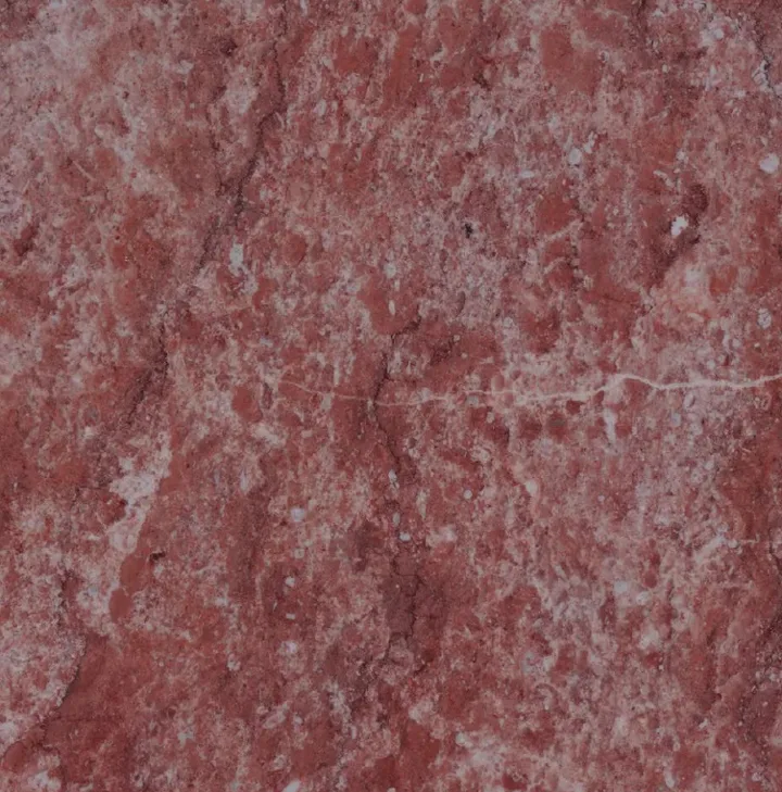 Rosso Ardente marble sample, close up